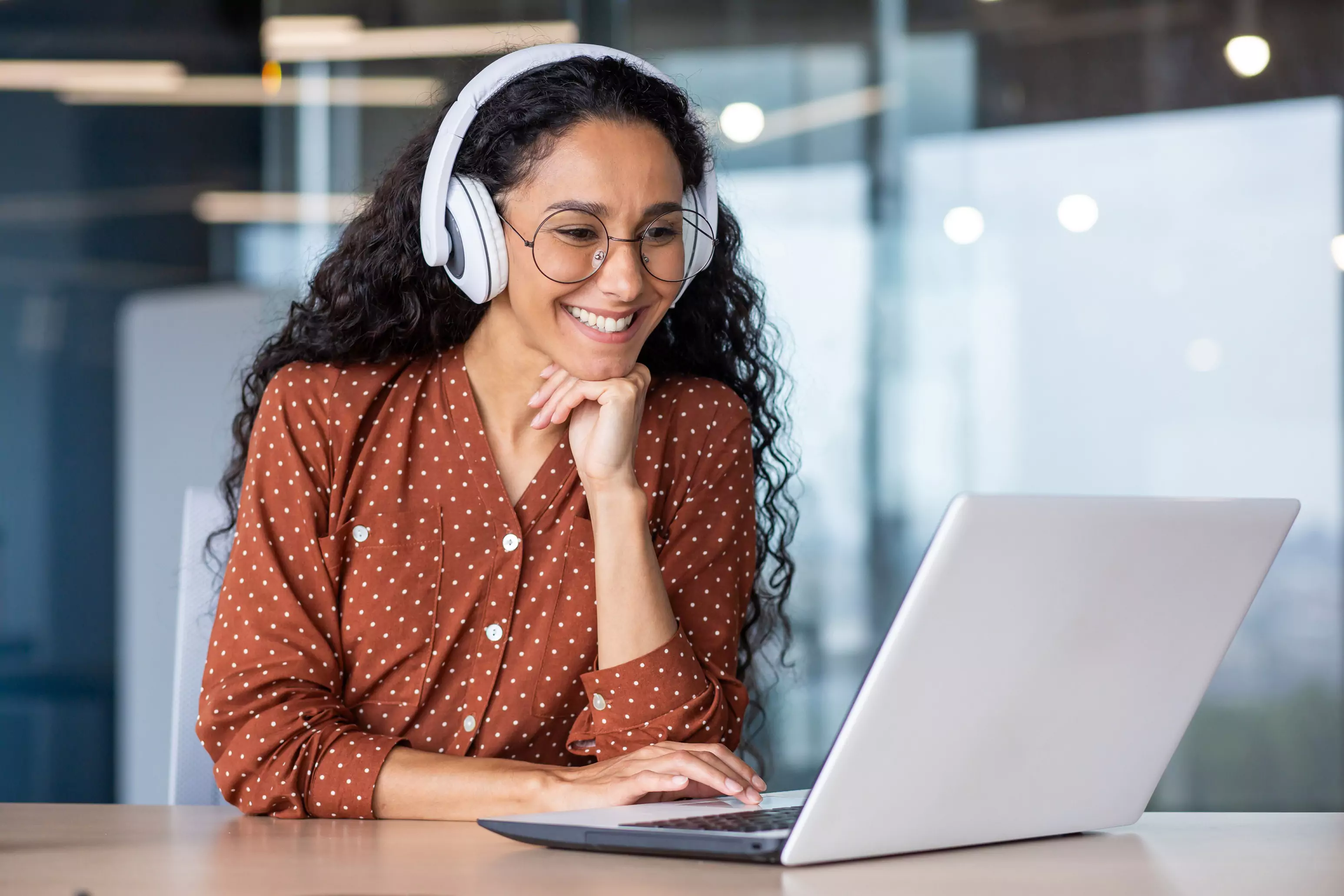 A woman takes an online course