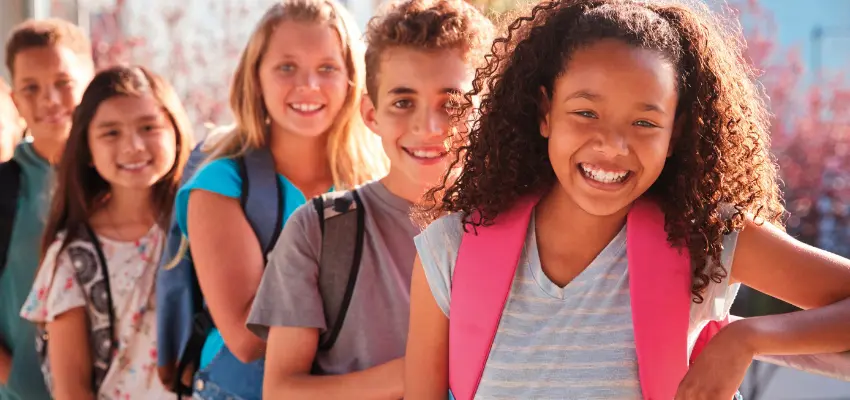 Group of happy children at school